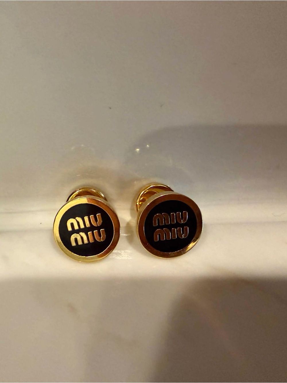 Miu Miu Gold and Black Enamel Logo Earrings